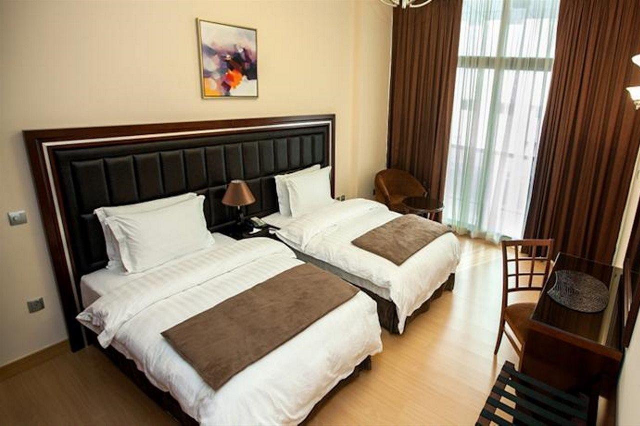 Xclusive Maples Hotel apartamento Dubái Exterior foto